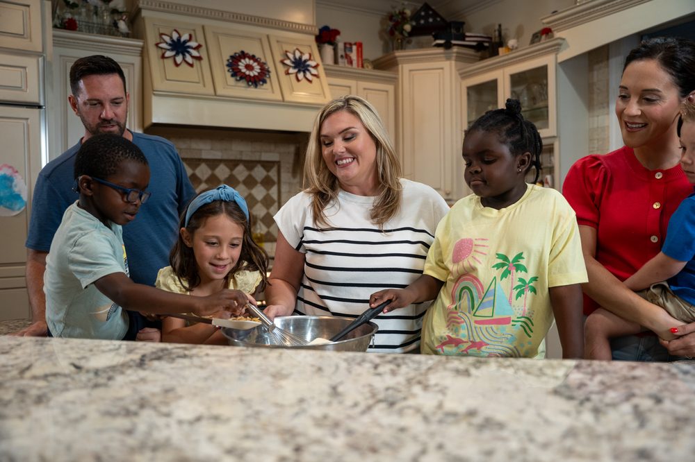 Emily Duda Buckley cooking with children