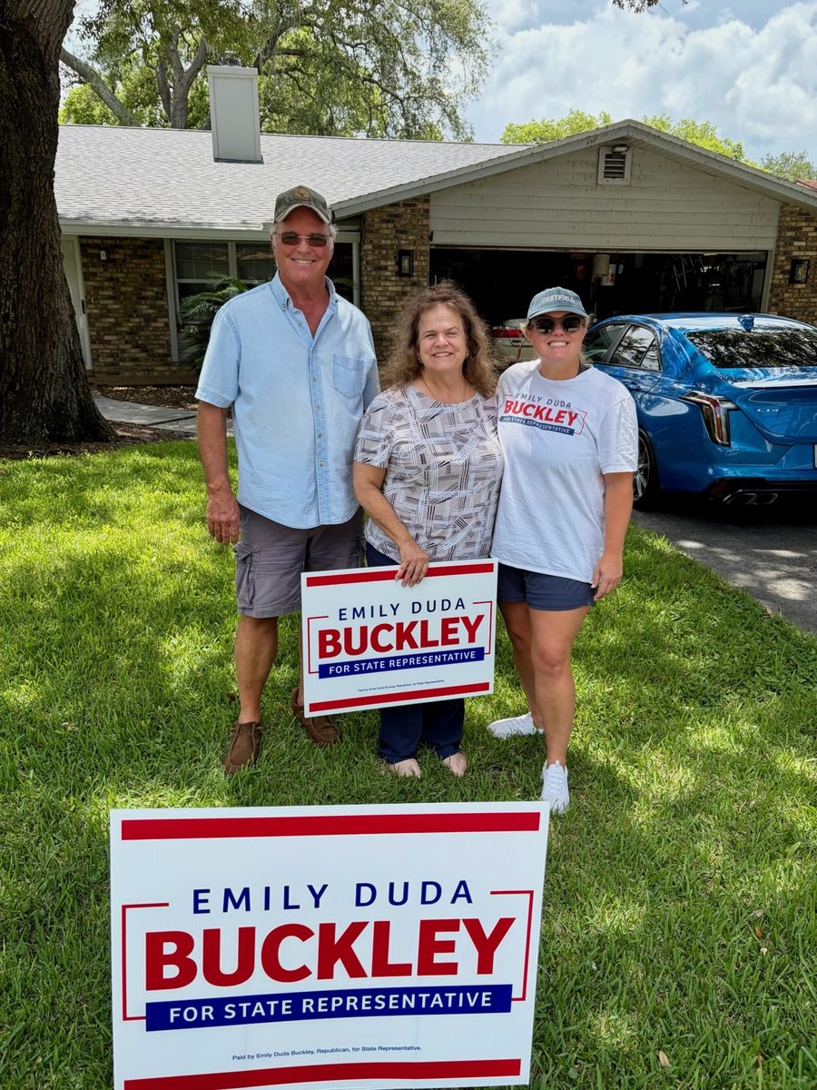 District 38 supporters with an Emily Duda Buckley yard sign